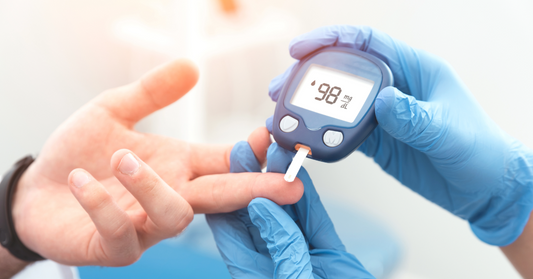 Image of a finger blood spot glucose test emphasizing the role of GH-Release in metabolic health and how HGH improves insulin resistance