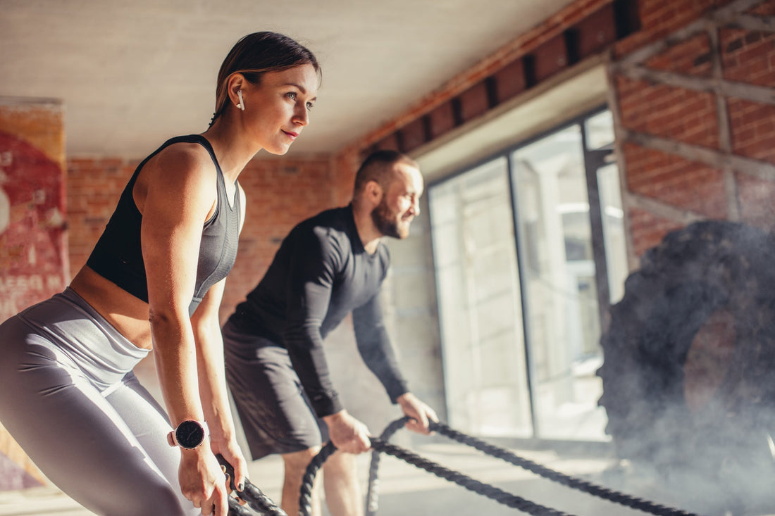 Image of fitness couple in a gym environment emphasizing the benefits of BPC-157 capsules for recovery and health